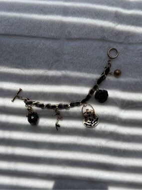 Women's Black Charm Bracelet with Floral and Orb Accents